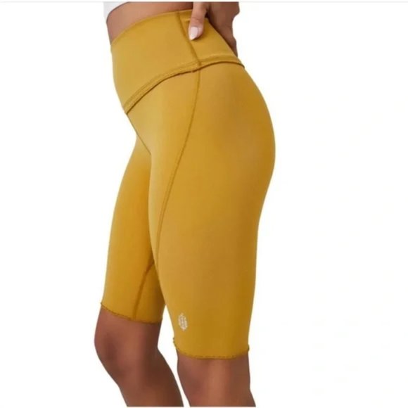 NWT Free People FP Movement Small Heart Rate Shorts in color Alchemy Gold - Picture 4 of 5